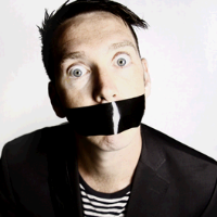The Boy With Tape On His Face